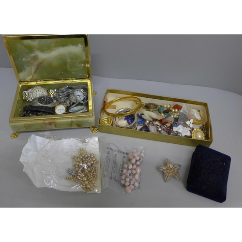 617 - An onyx jewellery box containing wristwatches and a collection of costume jewellery