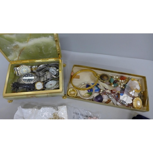 617 - An onyx jewellery box containing wristwatches and a collection of costume jewellery