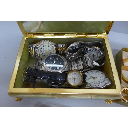 617 - An onyx jewellery box containing wristwatches and a collection of costume jewellery