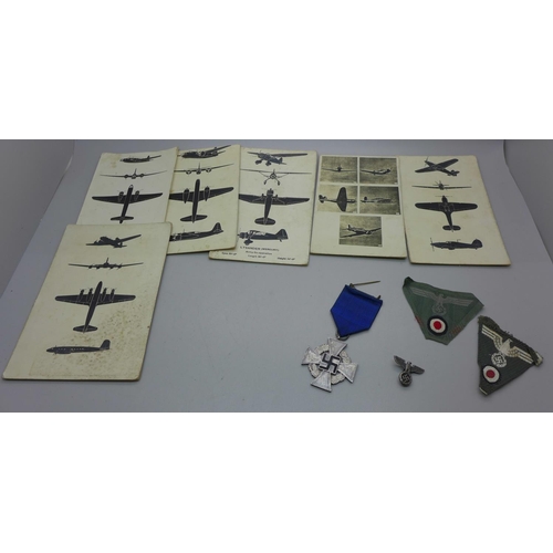 621 - A Third Reich wash basin, medals and RAF ID cards