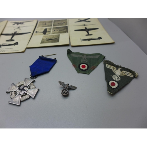 621 - A Third Reich wash basin, medals and RAF ID cards