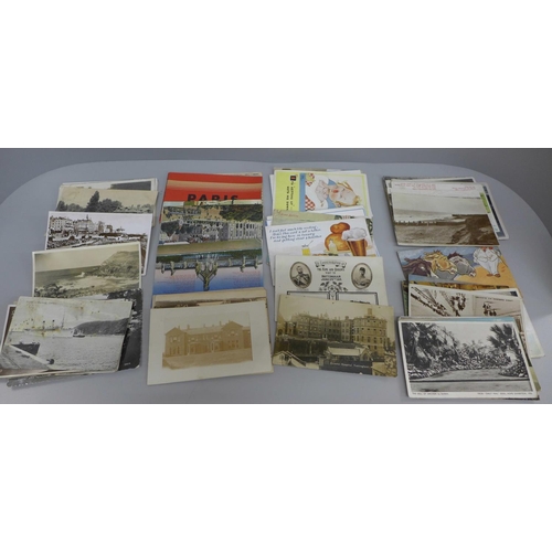 622 - Approximately eighty early 20th Century postcards