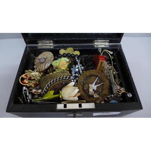 630 - A jewellery box with key and costume jewellery