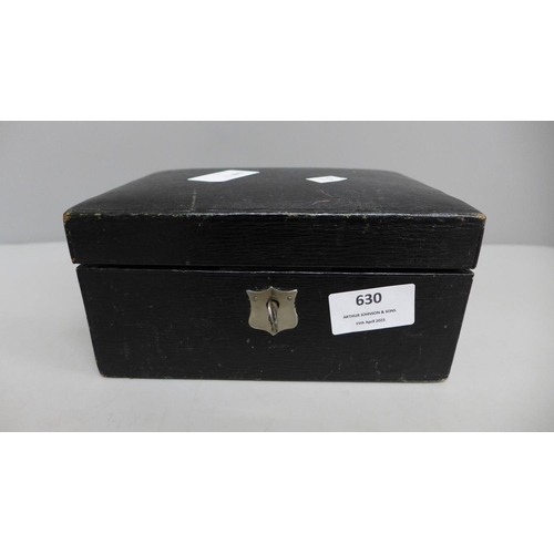 630 - A jewellery box with key and costume jewellery