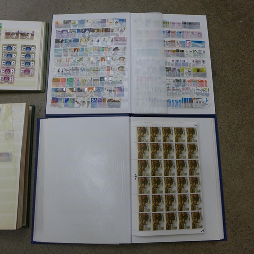 643 - Four albums of British stamps