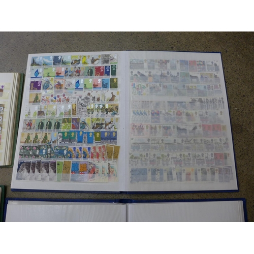 643 - Four albums of British stamps