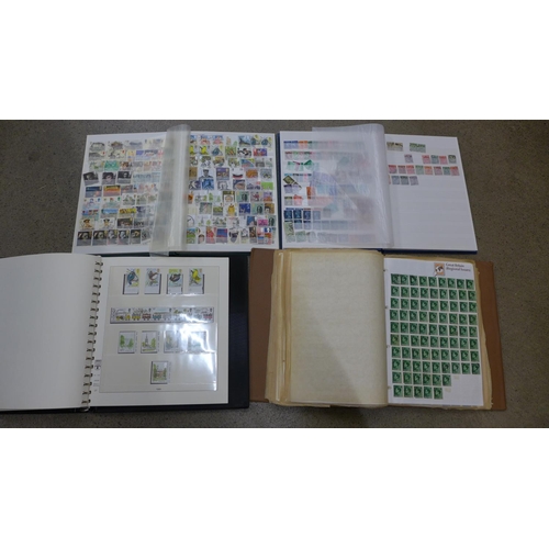 648 - Four albums of British and foreign stamps