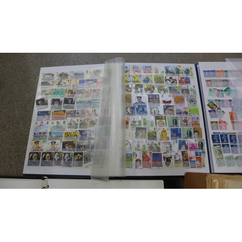 648 - Four albums of British and foreign stamps