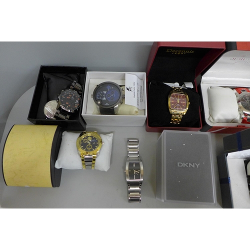 660 - A collection of boxed fashion wristwatches