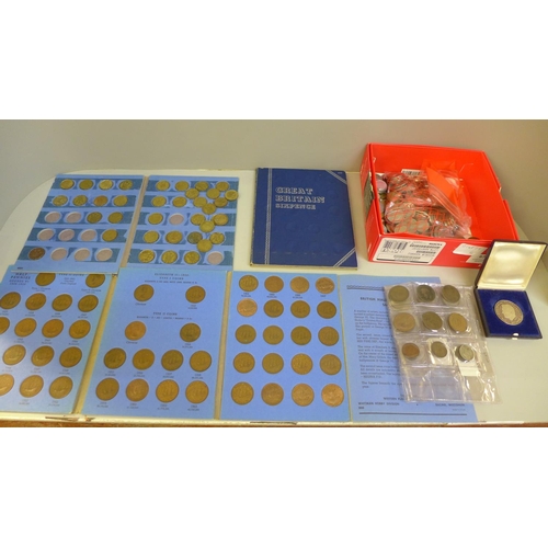 675 - A collection of coins, British, Irish and foreign, a Willy Brandt coin, Whitman sixpences and three ... 