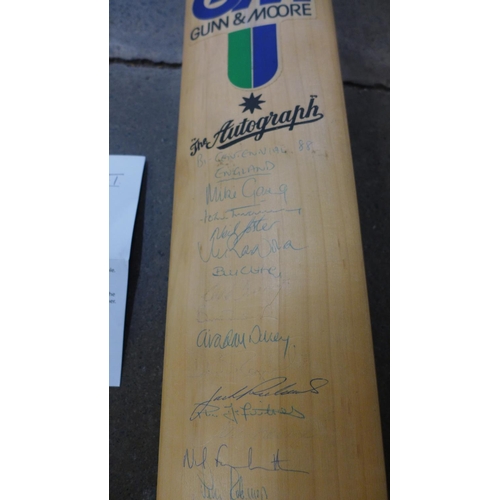 692 - A signed cricket bat, England and Australia with Universal Autograph Collectors Club certificate of ... 