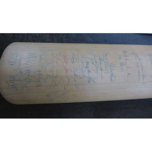 692 - A signed cricket bat, England and Australia with Universal Autograph Collectors Club certificate of ... 