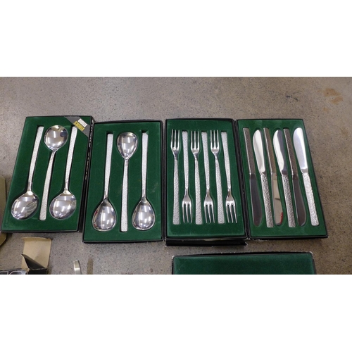 699 - Viners Studio cutlery, 9 boxes, comprises 6 pastry fork and cake lift, 6 pairs of fish eaters, 6 sou... 