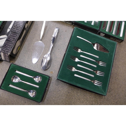 699 - Viners Studio cutlery, 9 boxes, comprises 6 pastry fork and cake lift, 6 pairs of fish eaters, 6 sou... 