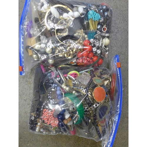 709 - Two bags of costume jewellery