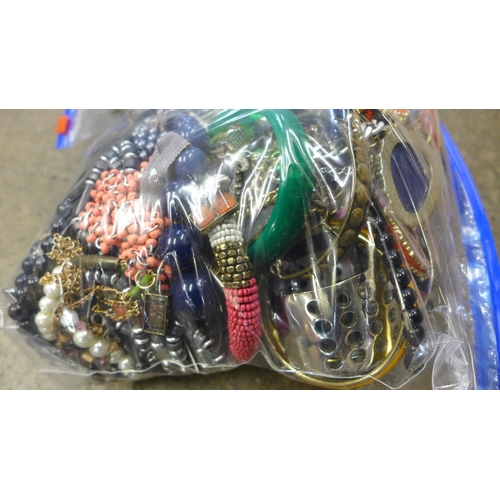 709 - Two bags of costume jewellery