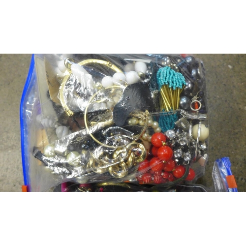 709 - Two bags of costume jewellery