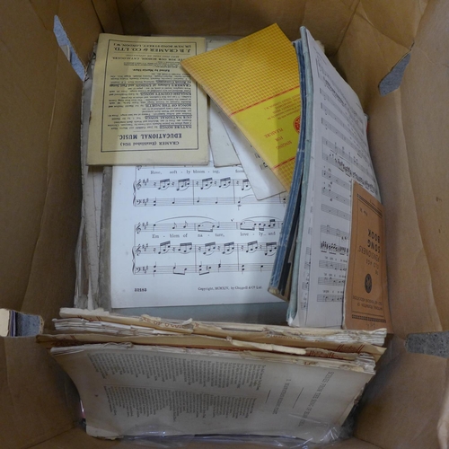 710 - A box of music books and sheet music