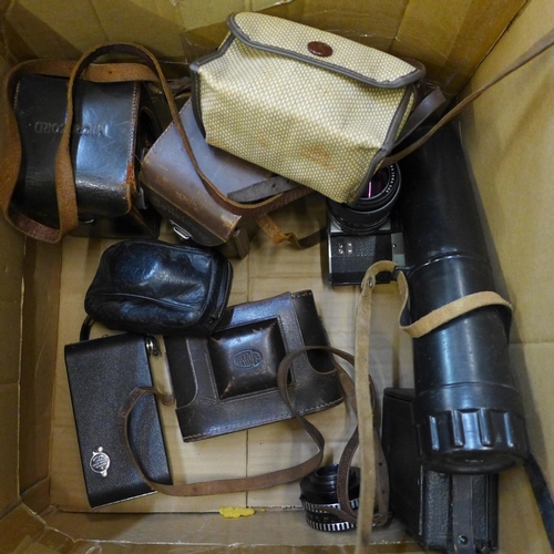 711 - A mixed collection of cameras, includes Microcard and Rolleicord, Pentax Spotmatic, Praktica TTL, Ko... 