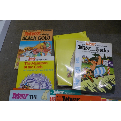 740 - A collection of Asterix comics and books