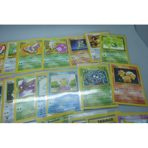 802 - Fifty vintage Pokemon cards, uncommon and common, base set, Jungle, Fossil and Team Rocket