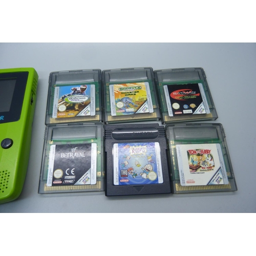 806 - A lime green Gameboy Colour with six games