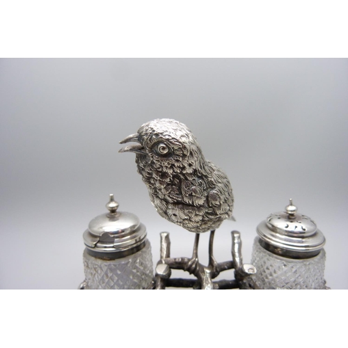 821 - A silver plated cruet in the form of a songbird perched on a branch, kite mark for 1872