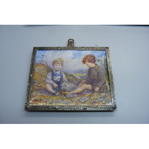 824 - A painting on vellum of two boys by Elizabeth Brockbank, framed and in original case