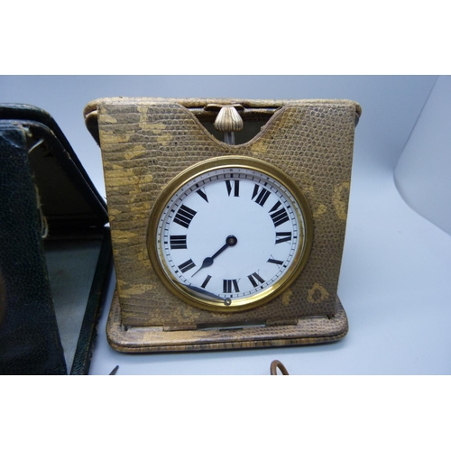 829 - A collection of pocket watches and two cased travel clocks/watches in leather holders, a/f