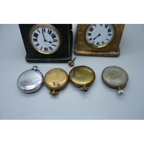 829 - A collection of pocket watches and two cased travel clocks/watches in leather holders, a/f