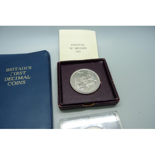 838 - A 1951 Festival of Britain Crown, other commemorative coins and a Decimal coin set