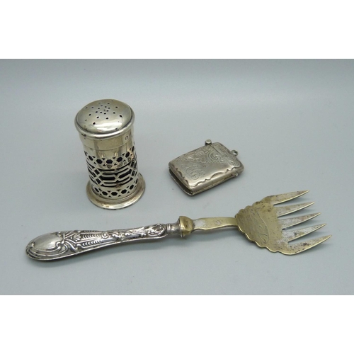 839 - A silver vesta case, a Victorian silver pepper and a fork with silver covered handle