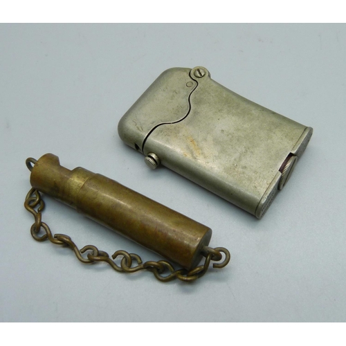 874 - A Thorens Swiss lighter, marked January 29th 1920, no. 137,508 and possibly miniature trench mirror