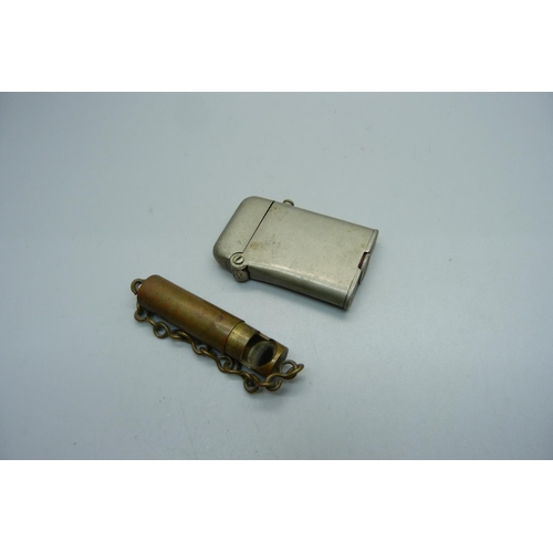 874 - A Thorens Swiss lighter, marked January 29th 1920, no. 137,508 and possibly miniature trench mirror