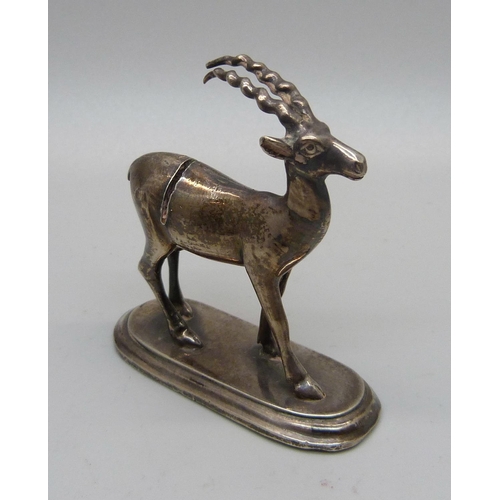 905 - An Ibex menu holder, in 925 silver