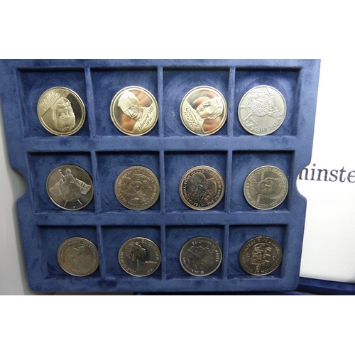 912 - A collection of commemorative coins, boxed, (36)