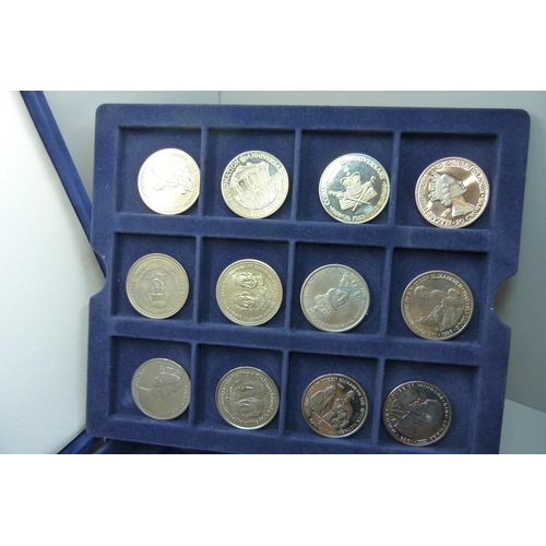 912 - A collection of commemorative coins, boxed, (36)