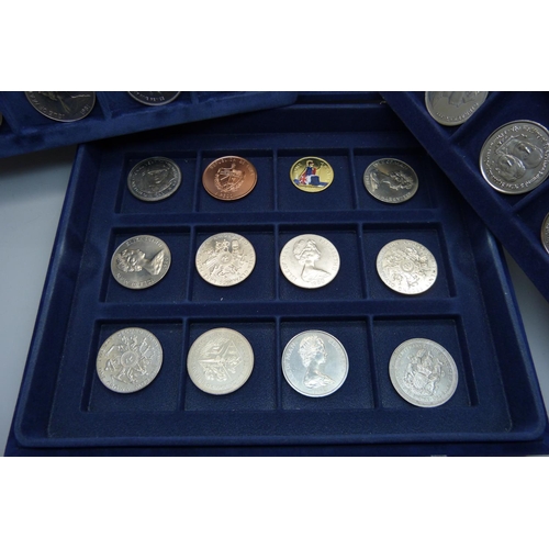 912 - A collection of commemorative coins, boxed, (36)