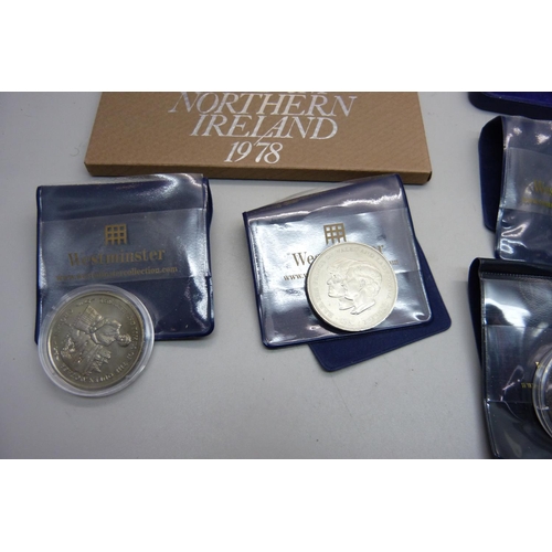 915 - Eight commemorative coins including a silver £5 Queen and Queen Mother coin and two sets of British ... 