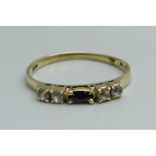 938 - A yellow metal sapphire and white stone ring, 1.1g, J