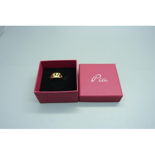 949 - A silver gilt designer ring, signed Pia, in original box, P