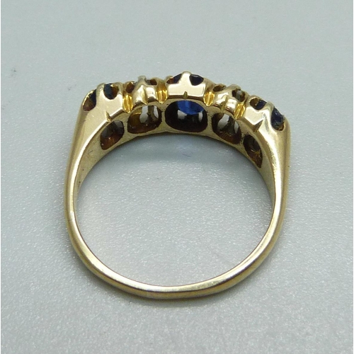 950 - An 18ct gold, sapphire and diamond ring, 4g, K