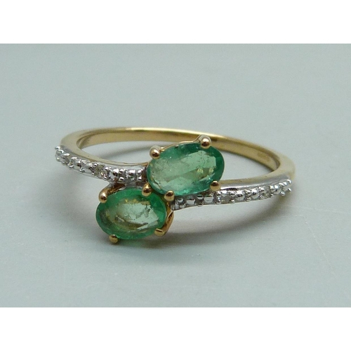 952 - A 9ct gold Zambian emerald and diamond ring, with certificate, 2.2g, Q