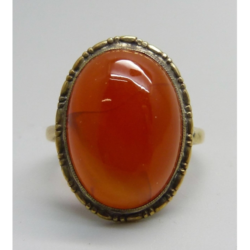 955 - A silver gilt and orange cabochon ring, N