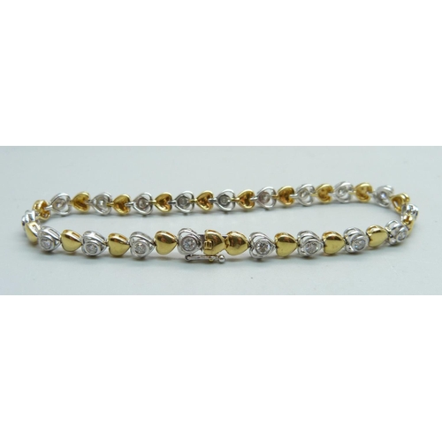 960 - An 18ct gold and diamond tennis bracelet, approximately 1.20 carat weight, 12.6g