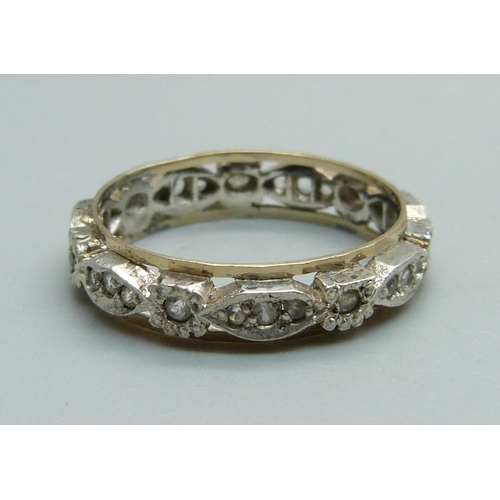 964 - A 9ct gold and silver ring, T