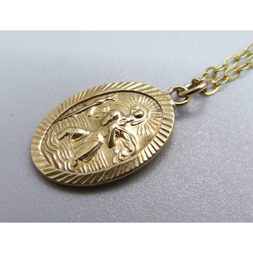 966 - A 9ct gold St. Christopher pendant and chain, 2.3g