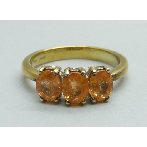 967 - A silver gilt and sunstone trilogy ring