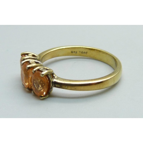 967 - A silver gilt and sunstone trilogy ring