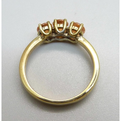 967 - A silver gilt and sunstone trilogy ring